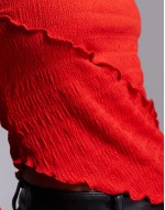 long sve crinkle textured top with asymmetric hem in red