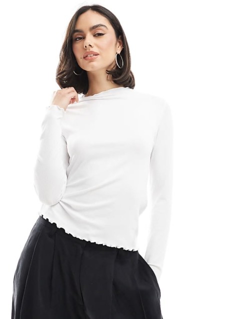 ribbed long sve top with lettuce edge detail in white