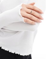ribbed long sve top with lettuce edge detail in white