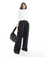 ribbed long sve top with lettuce edge detail in white