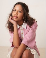 Unisex contrast collar polo shirt in pink gingham