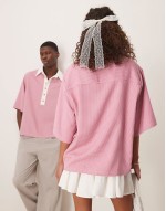 Unisex contrast collar polo shirt in pink gingham