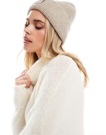 knitted roll neck mini dress in cream melange