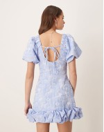 jacquard bubble hem mini dress in baby blue floral